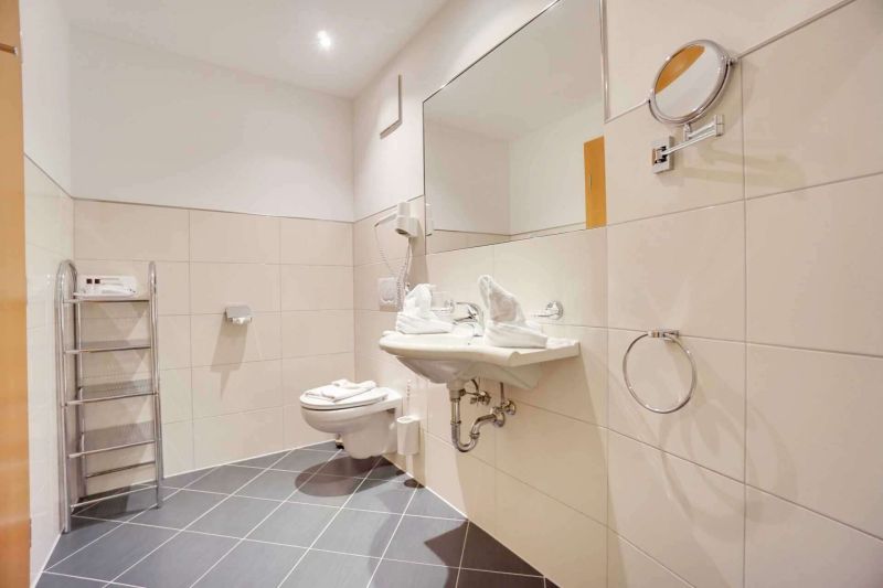 Bathroom with shower and sink in apartment type D