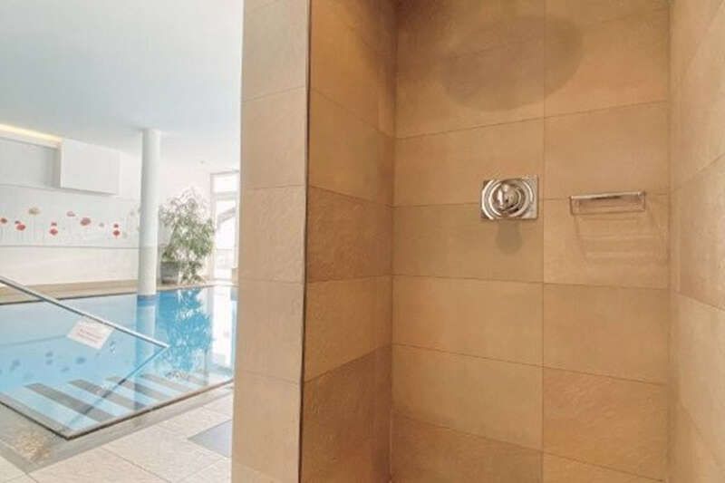 Shower in the swimming pool at Hotel Philipp