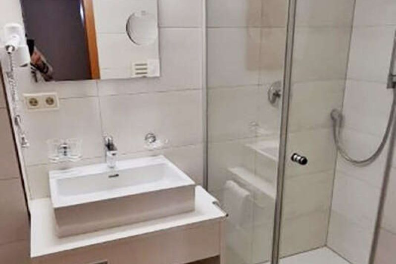 Bathroom with shower and toilet in apartment type C