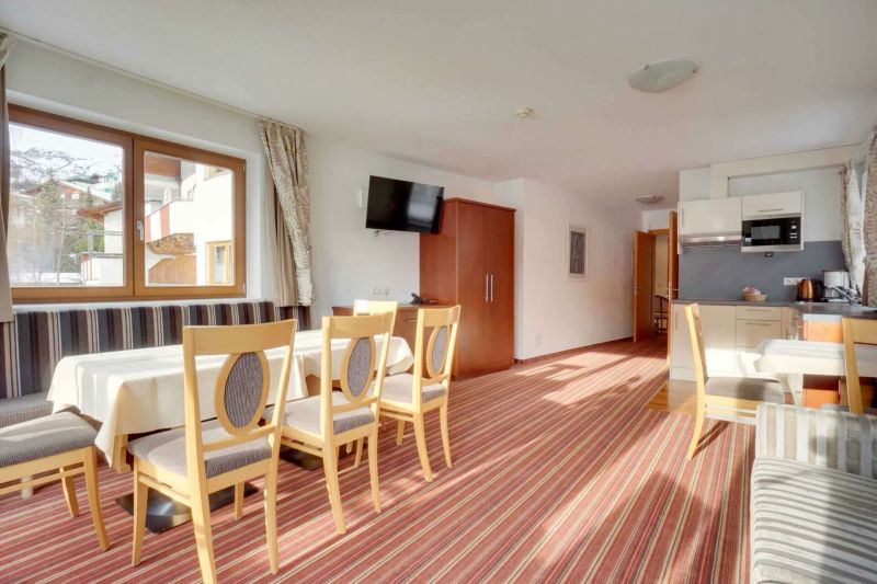 Kitchen-living room with balcony in apartment type H