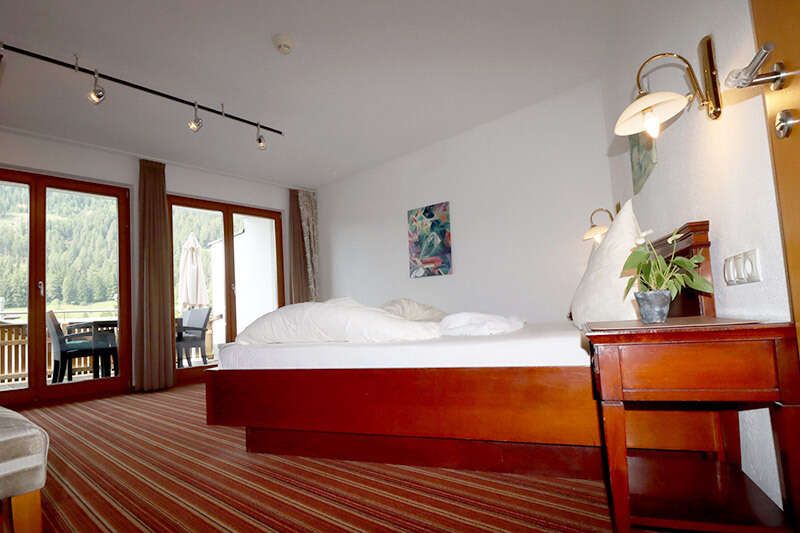Schlafzimmer im Appartement Typ F mit Terasse