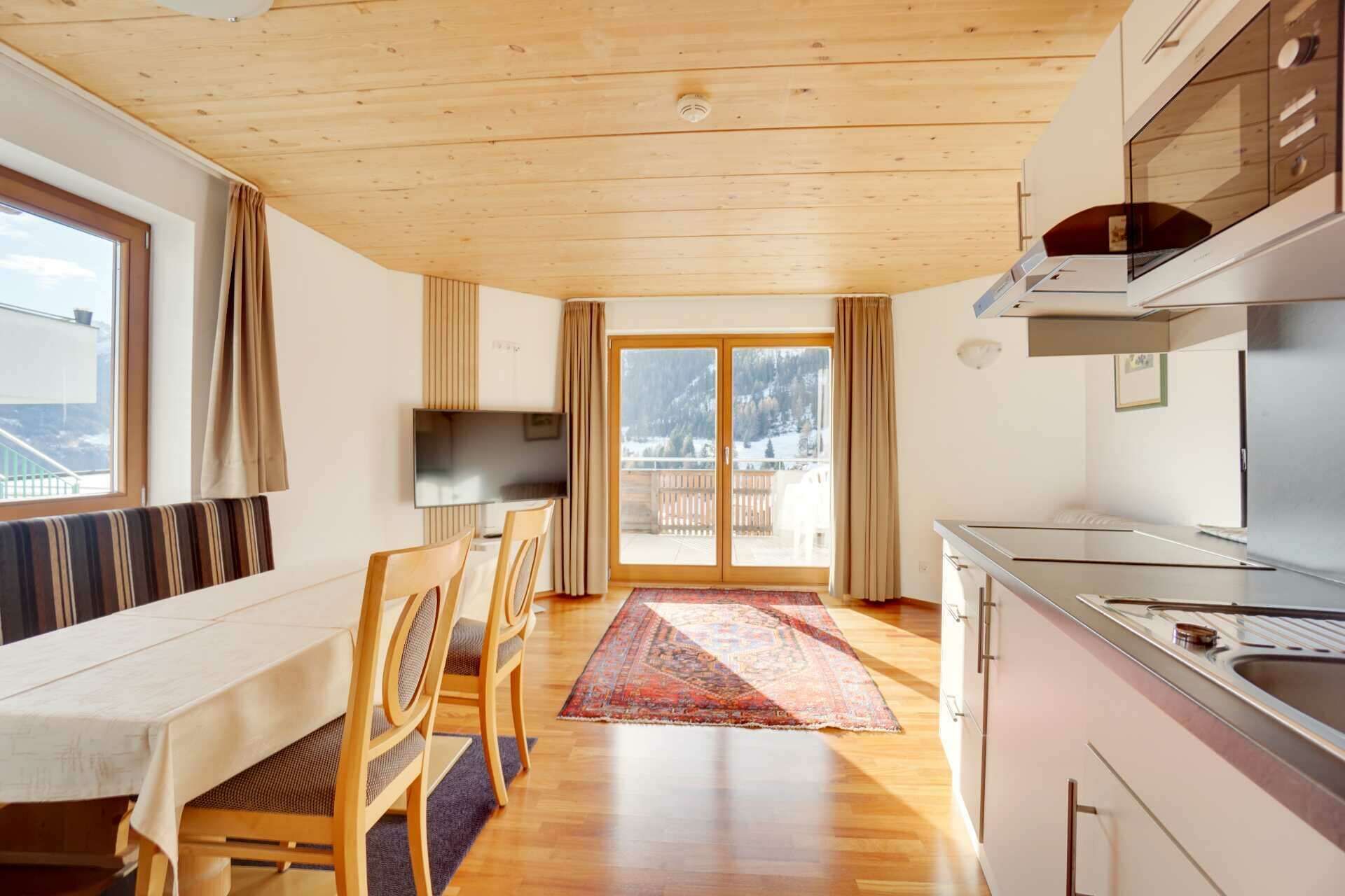 Bedroom with balcony in Apartment Type I in Hotel Philipp