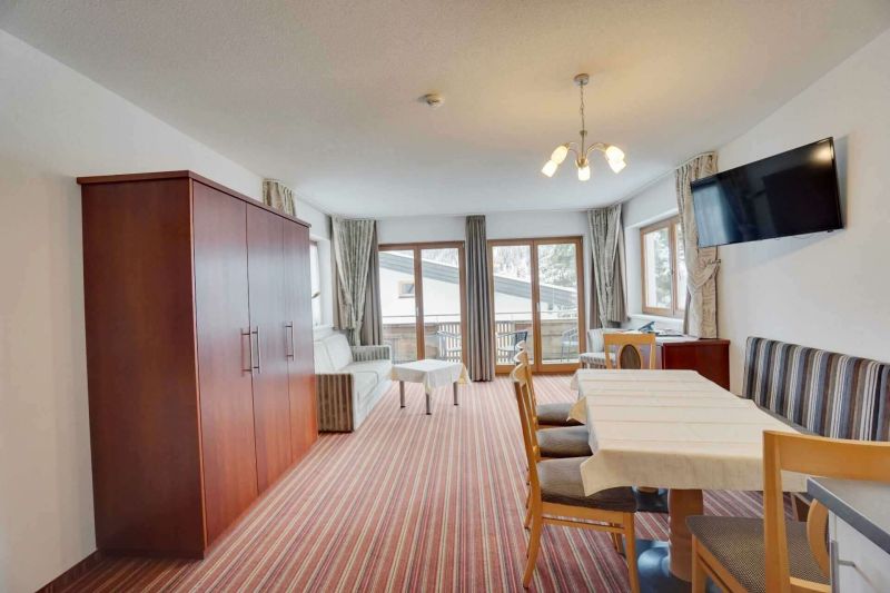 Living room with balcony in apartment type D