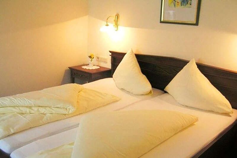 Double bed in Apartment Type C at Hotel Philipp