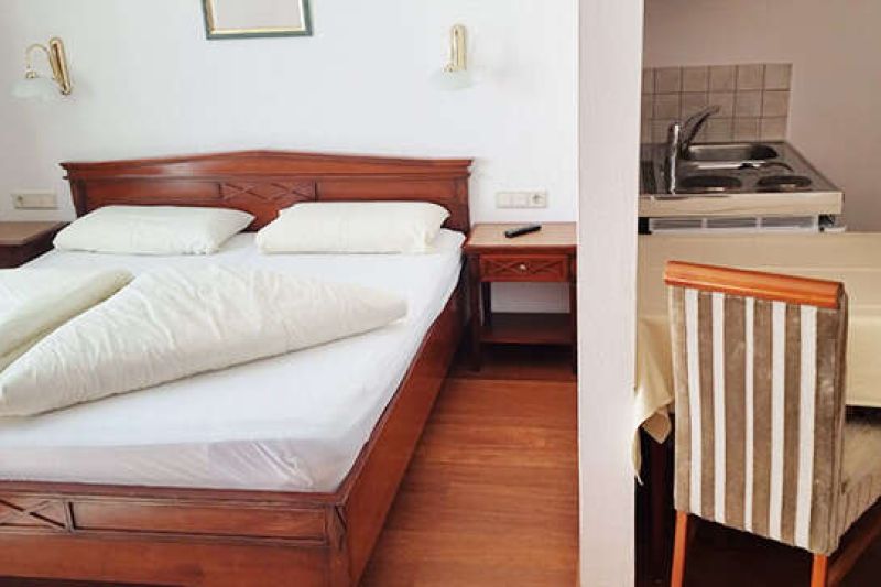 Bedroom with kitchenette in studio type B